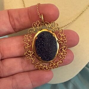 Elegant Gold and Sparkling Pendant Necklace